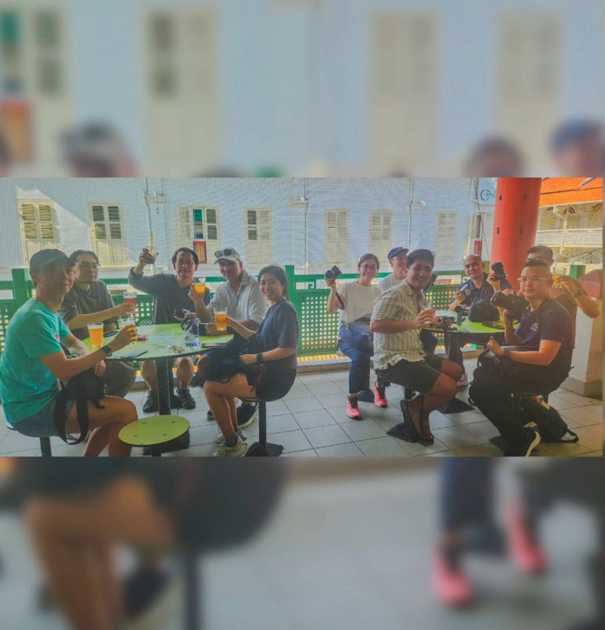 Lanterns glowing above the crowd in Singapore Chinatown at night